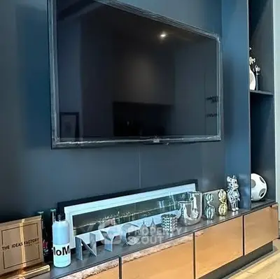 Modern living room with sleek TV setup and stylish decor