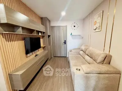 Modern living room with sleek wooden furniture and cozy sofa