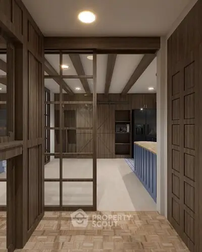 Modern interior with wooden accents and open layout, featuring a stylish kitchen and cozy living area.