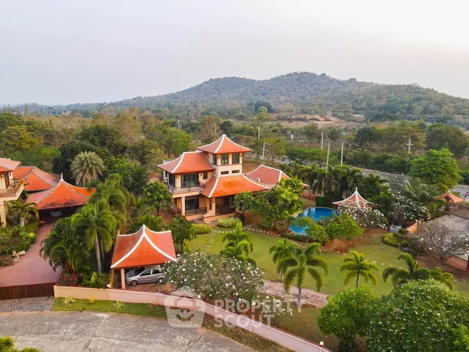 Luxurious villa with stunning garden and pool in serene hillside setting