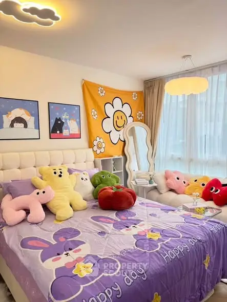 Charming bedroom with playful decor and plush toys, perfect for a cozy and cheerful atmosphere.