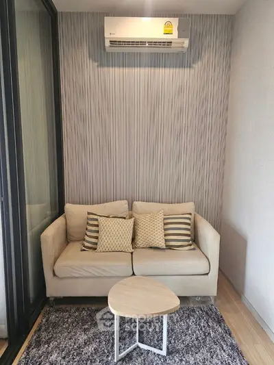 Cozy living room with modern sofa and air conditioning in stylish apartment