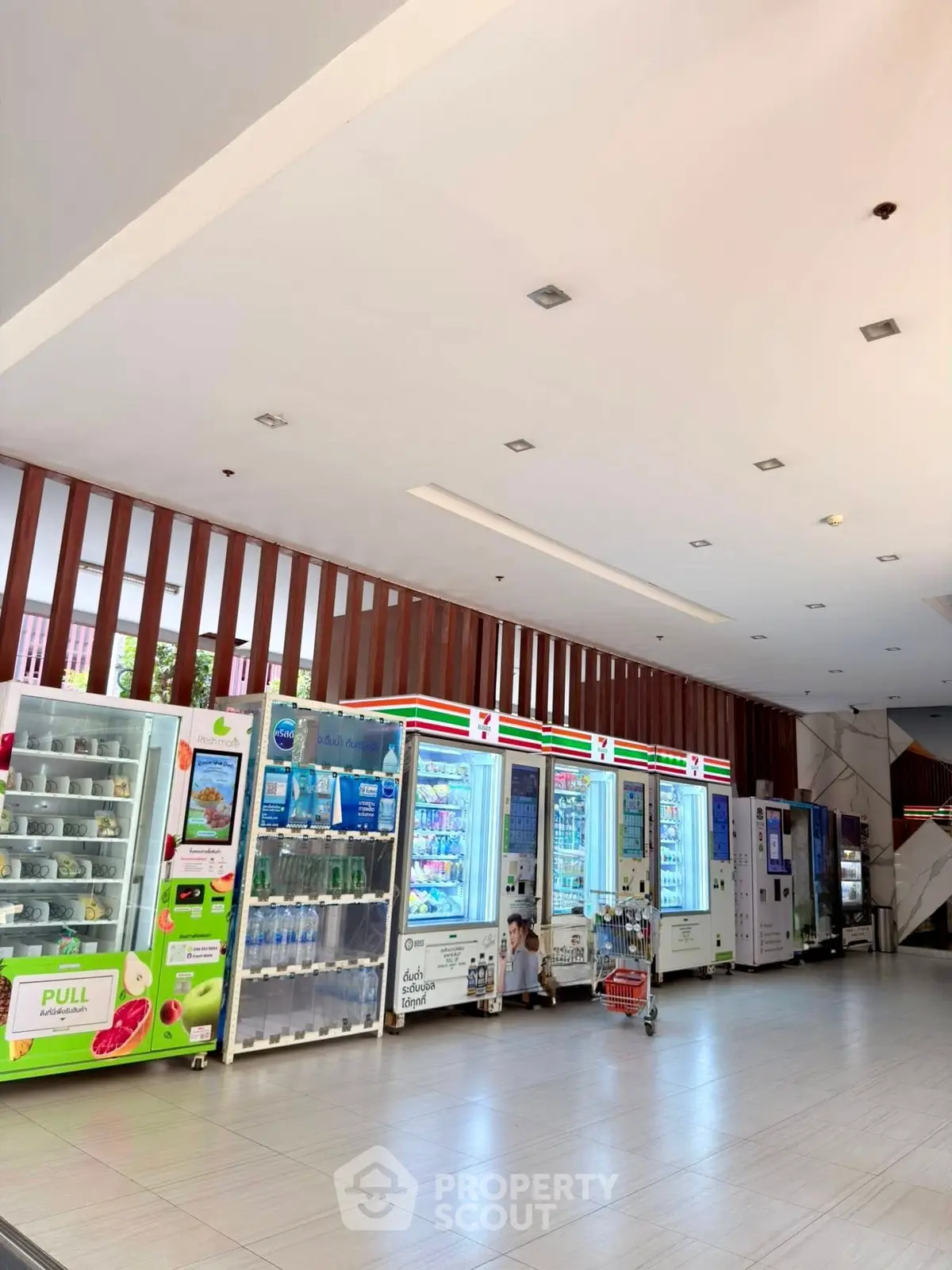 Modern building lobby with vending machines and sleek design
