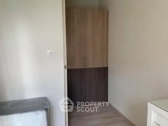 Compact bedroom with modern wardrobe and minimalistic design