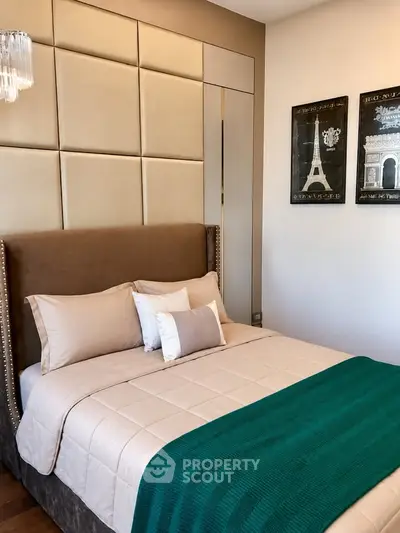 Luxurious bedroom with elegant decor and plush bedding in modern apartment