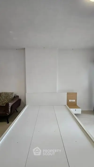 Modern living room with minimalist design and sleek furniture, perfect for contemporary lifestyle.