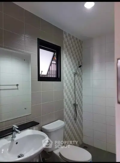 Modern bathroom with sleek fixtures and stylish tile design