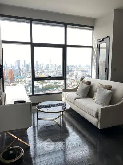 Modern living room with stunning city view and elegant furniture