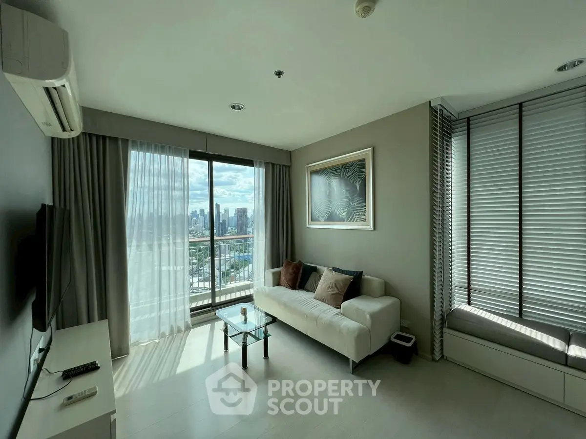 Spacious living room with city view and modern decor