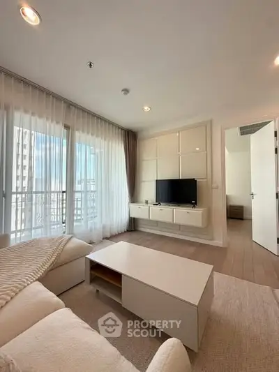 Modern living room with elegant decor and natural light