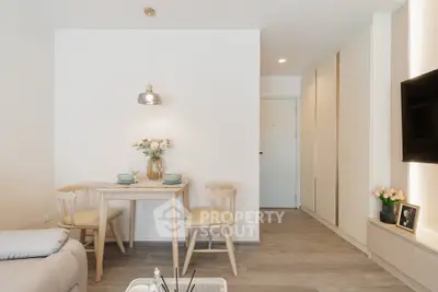 Modern living room with cozy dining area and stylish decor