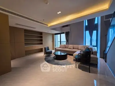 Spacious modern living room with city view and elegant furnishings