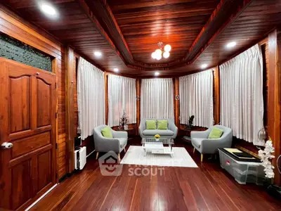Stunning wooden living room with elegant seating and ambient lighting
