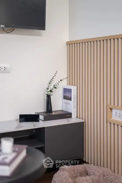 Modern living room corner with sleek decor and cozy ambiance