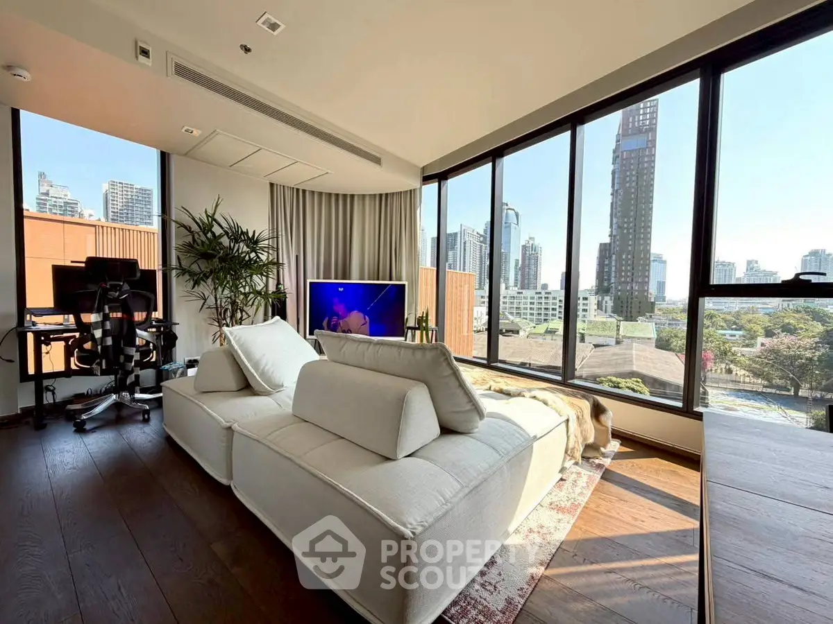 Modern living room with panoramic city view and stylish decor