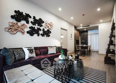 Modern living room with stylish decor and open layout, perfect for entertaining.