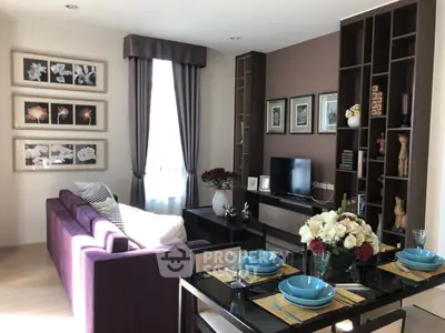 Stylish living room with modern decor and elegant dining setup