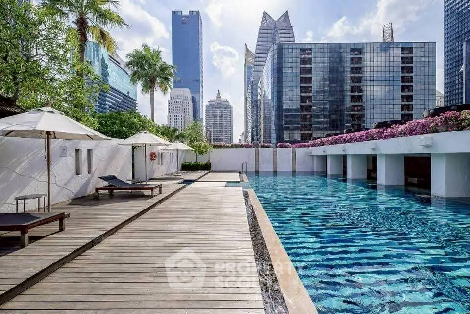 Luxurious rooftop pool with stunning cityscape views and modern amenities.
