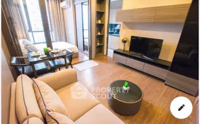 Modern living room with open layout and stylish furniture in a cozy apartment.