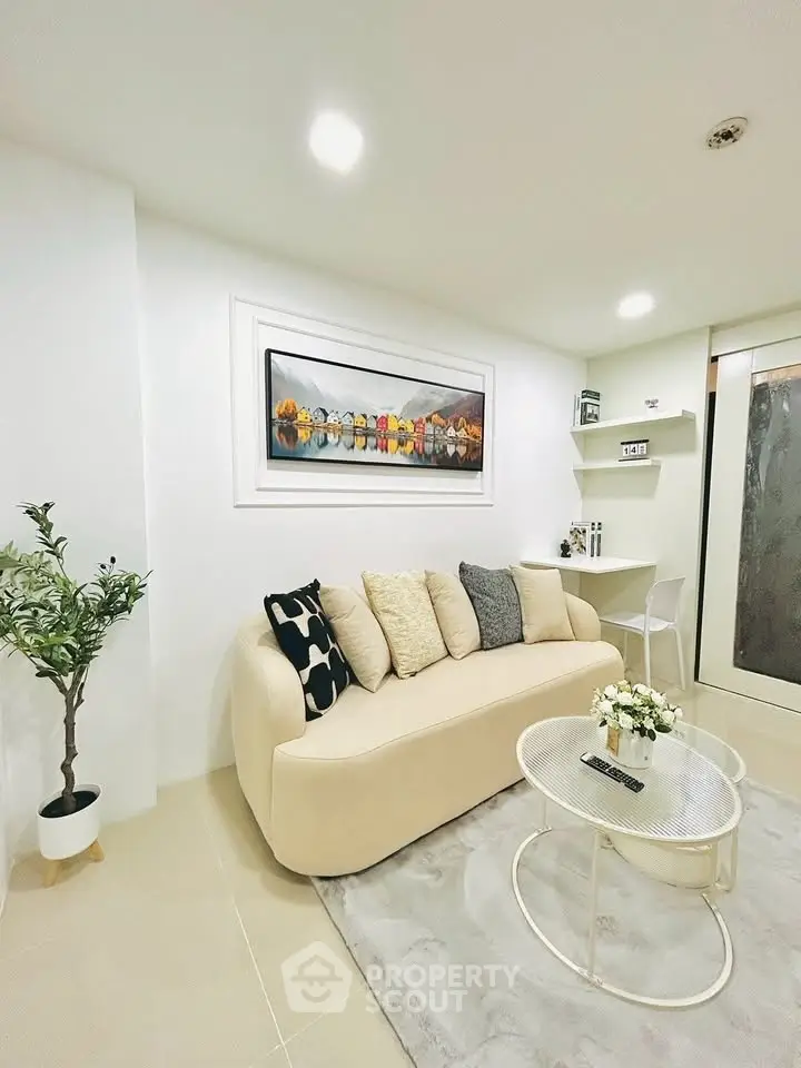 Modern living room with elegant decor and cozy seating area