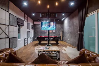 Luxurious entertainment room with pool table and modern decor