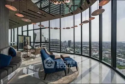 Luxurious high-rise living room with panoramic city views and modern furnishings.