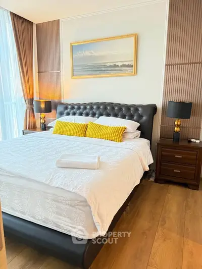 Luxurious bedroom with elegant decor and plush bedding in modern apartment