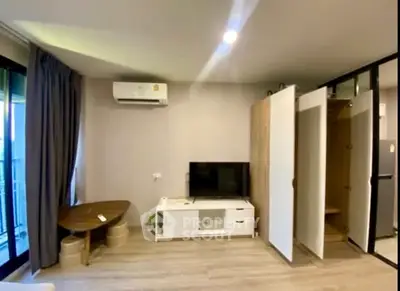 Modern living room with air conditioning and stylish furniture in a cozy apartment.