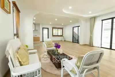 Spacious living room with elegant decor and natural light