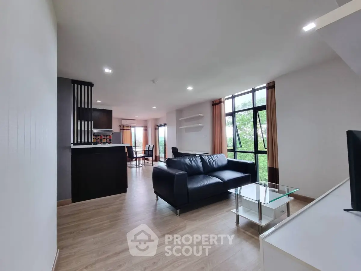 Spacious modern living room with open layout and stylish furniture