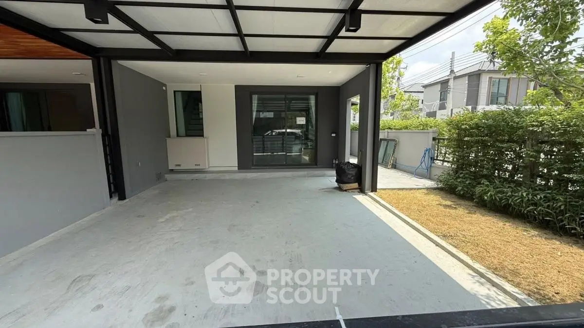 Spacious modern carport with sleek design and ample natural light, perfect for urban living.