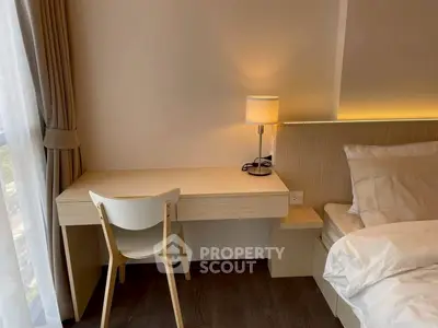 Modern bedroom with study desk and elegant lighting