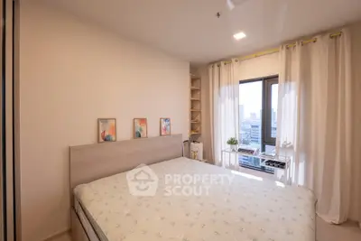 Cozy bedroom with city view and modern decor