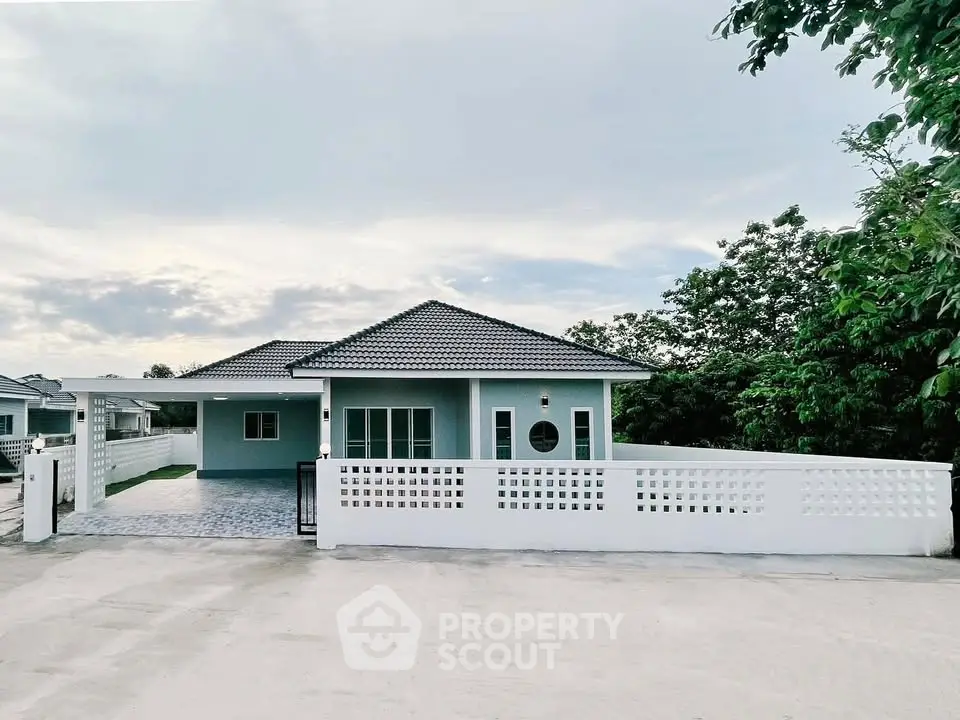 Charming single-story home with modern design and spacious driveway
