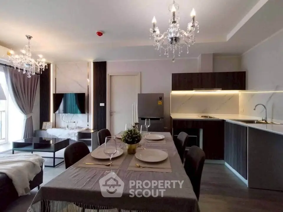 Luxurious modern living room with elegant dining area and stylish kitchen