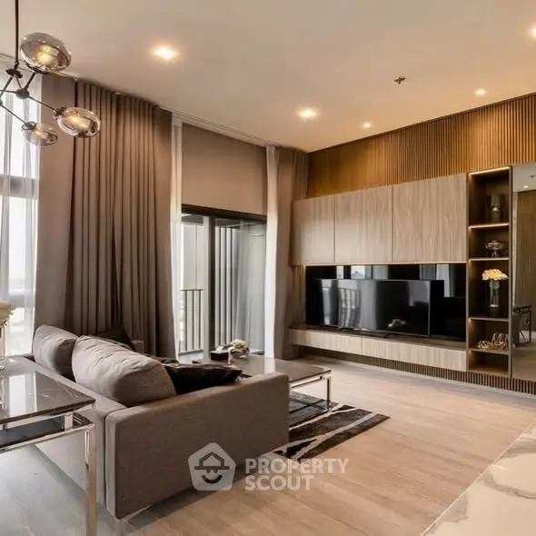 Luxurious modern living room with sleek design and large TV setup