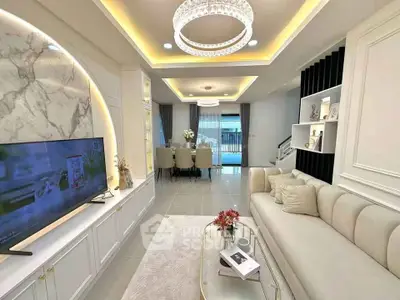 Luxurious living room with elegant chandelier and modern decor