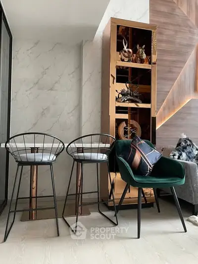 Modern living room with stylish chairs and decorative shelving