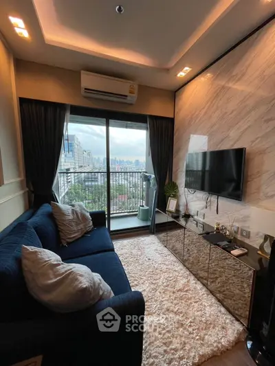 Stylish living room with city view, plush sofa, and modern decor in high-rise apartment.