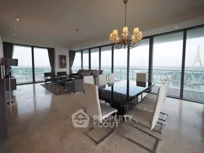 Luxurious open-plan living and dining area with panoramic city views and elegant furnishings.