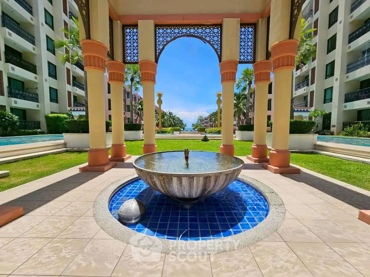 Luxurious garden view with elegant fountain in upscale residential complex