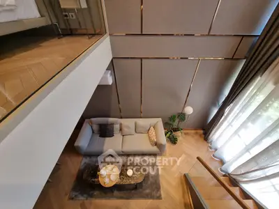 Luxurious modern living room with high ceiling and elegant decor