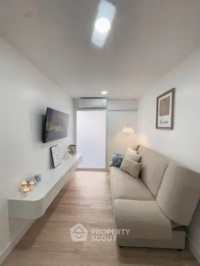 Cozy minimalist living room with modern decor and natural light