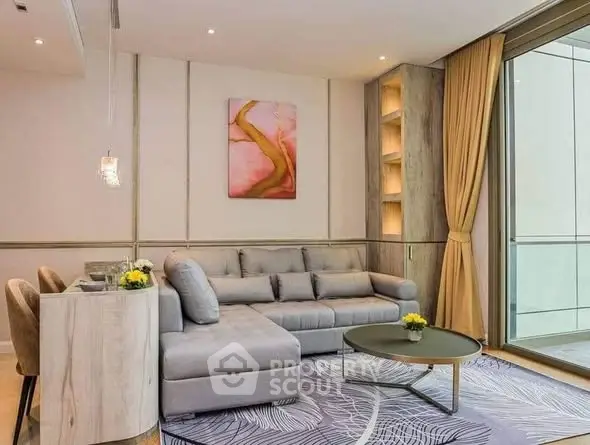 Modern living room with stylish decor and large windows in a luxury apartment.