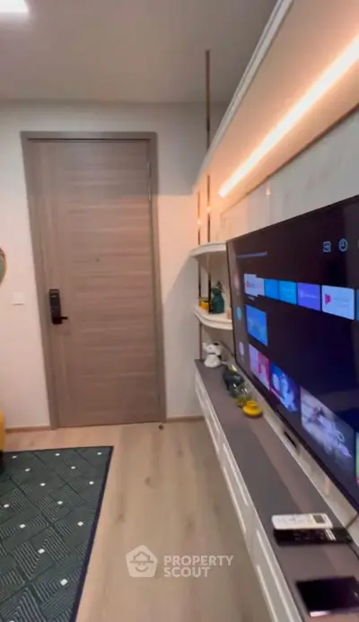 Modern living room with sleek TV setup and stylish decor