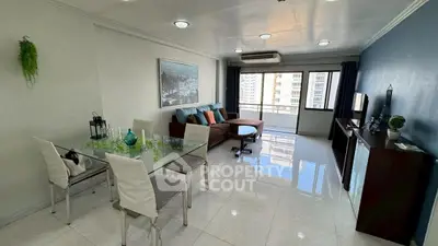 Spacious living room with modern decor and city view, perfect for urban living.