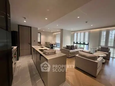 Spacious modern living room with open kitchen and elegant decor