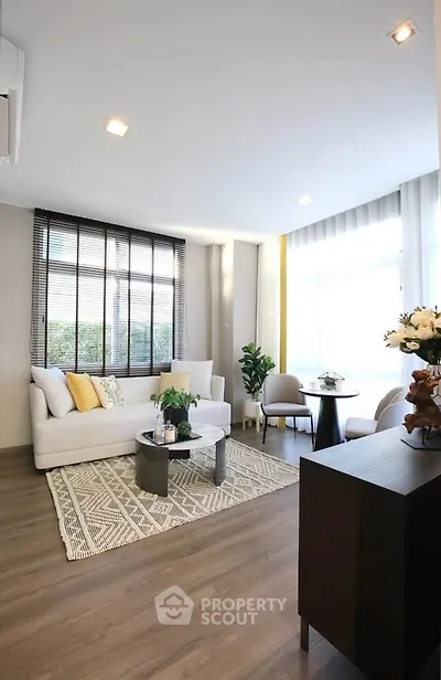 Modern living room with stylish decor and natural light