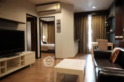 Modern apartment living room with sleek furniture and cozy ambiance