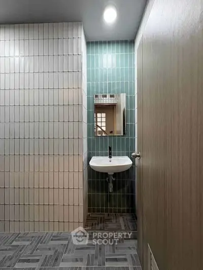 Modern bathroom with stylish tiles and sleek sink design